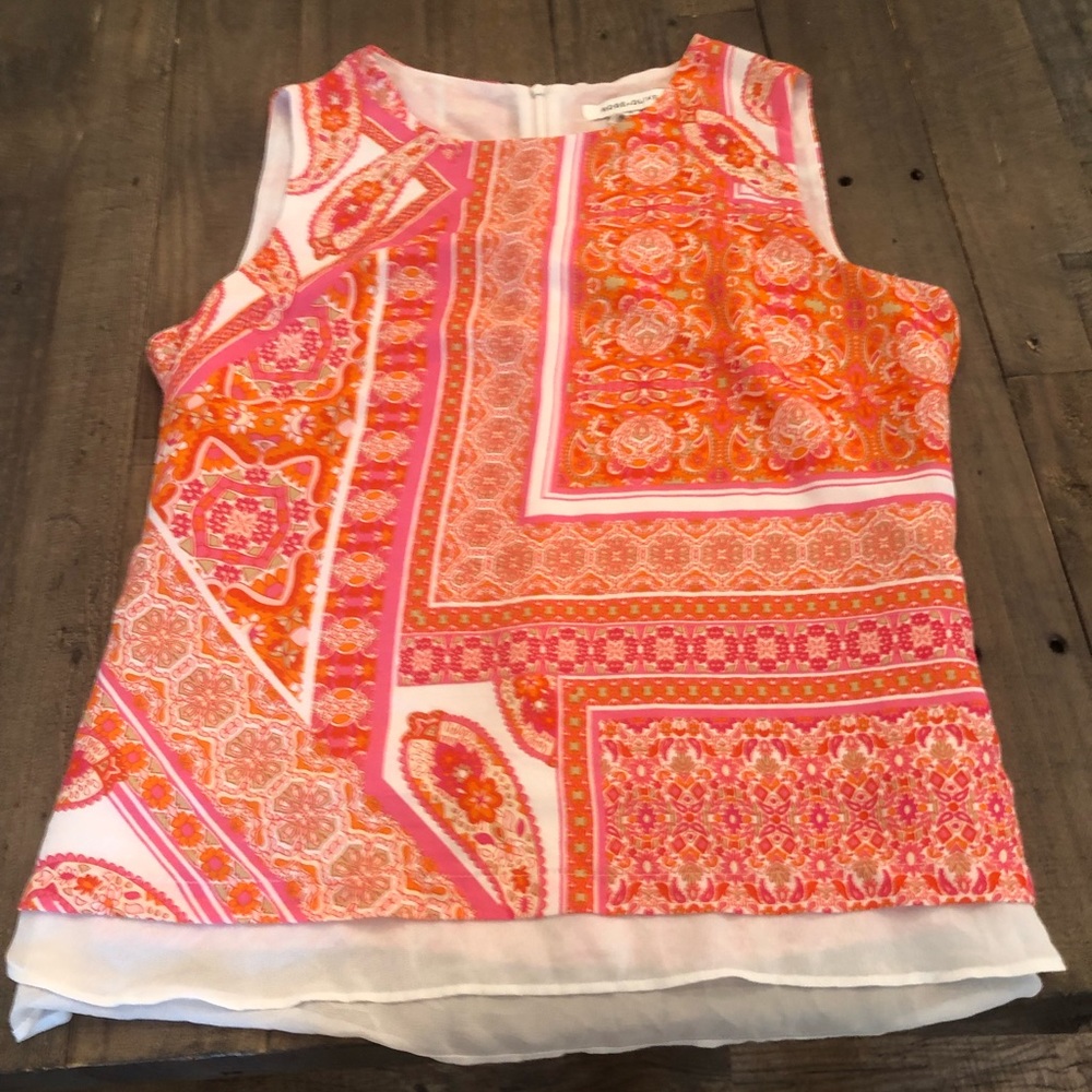 Silky sleeveless blouse. Size L never worn